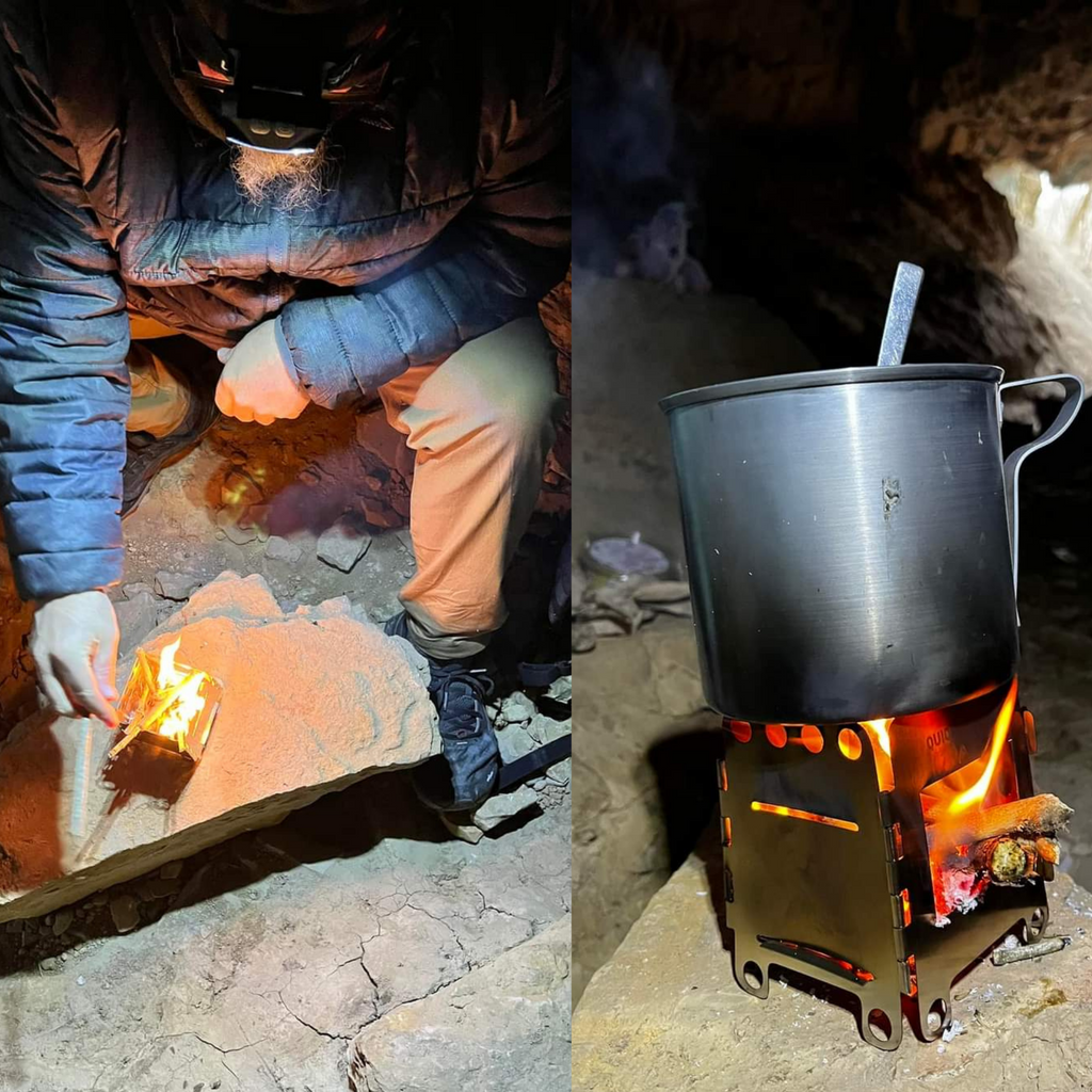 A person tends to a small fire using the Portable Mini Foldable Wood Burning Survival Stove by QUICKSURVIVE in an outdoor setting. The fire heats a pot, which is placed on the stove, making it an essential item for survival packs.