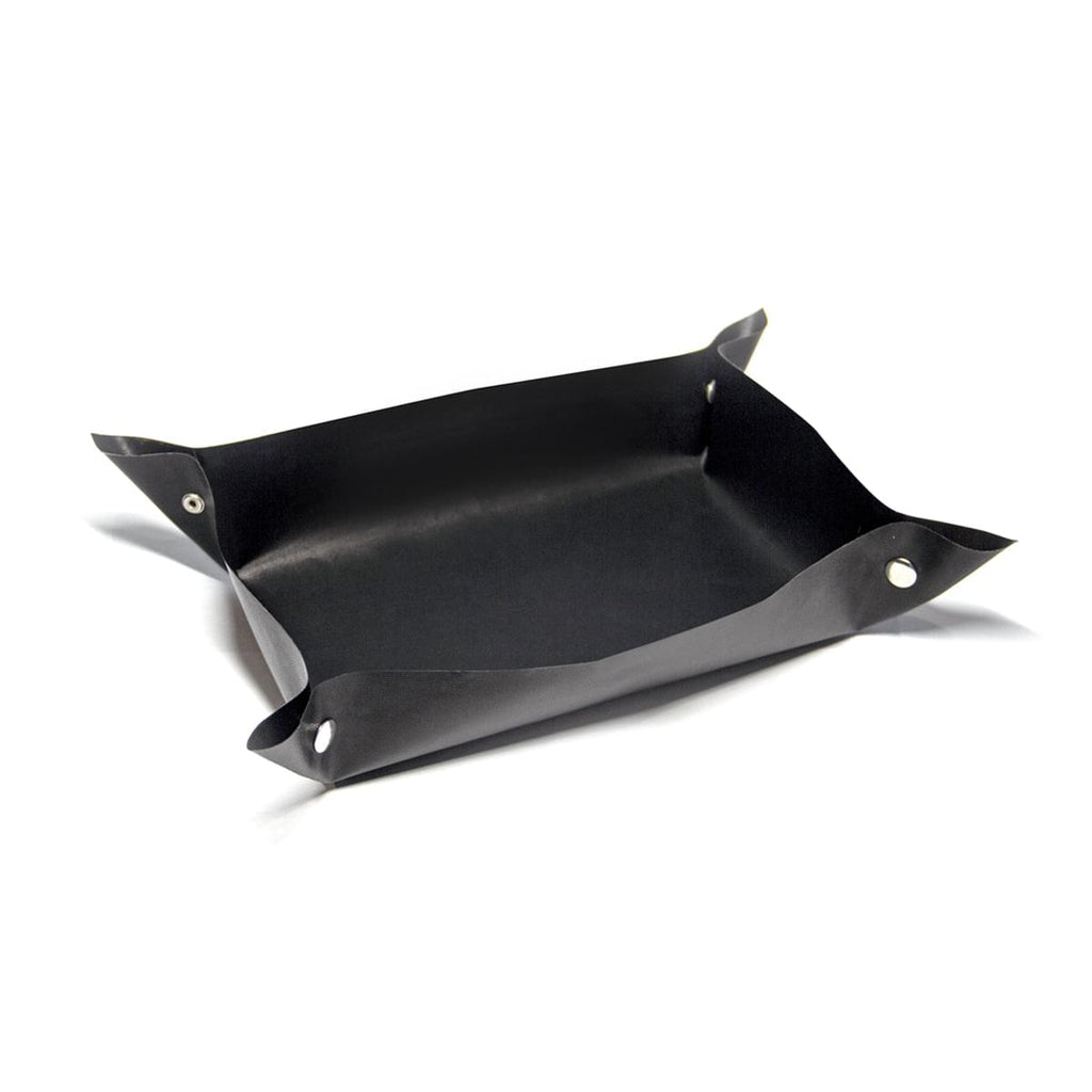 A black BBQ Fiberglass Grill Mat on a white surface.