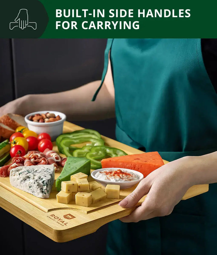 A foodie woman confidently carries the 12x18 Royal Craft Wood bamboo cutting board with built-in side handles, perfect for using the XSpecial blade meat tenderizer tool.