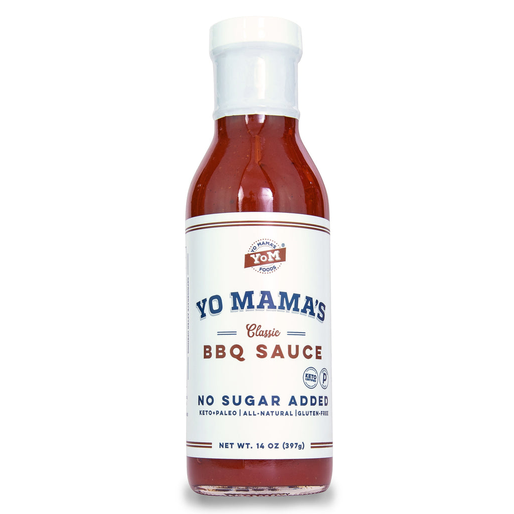 A bottle of Classic BBQ sauce from Yo Mama's Foods, perfect for Meat Lovers, on a white background.