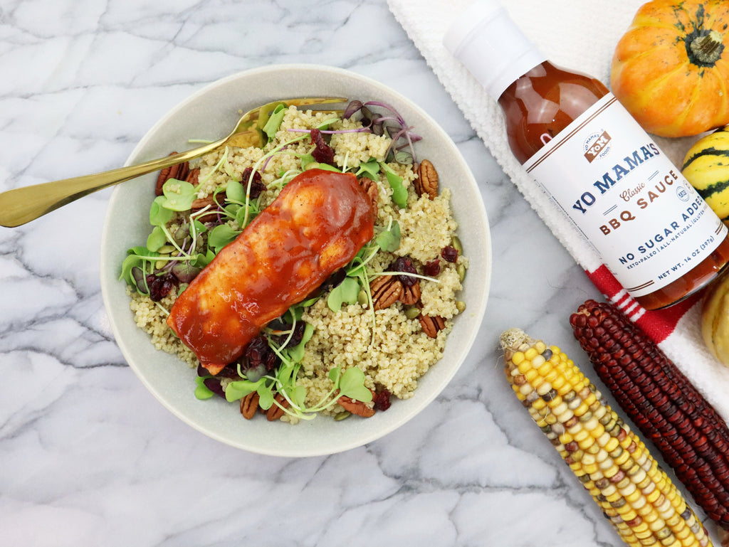 A bowl of couscous, corn, and a bottle of Yo Mama's Foods Classic BBQ (Keto and Paleo certified) sauce from the XSpecial Marketplace.