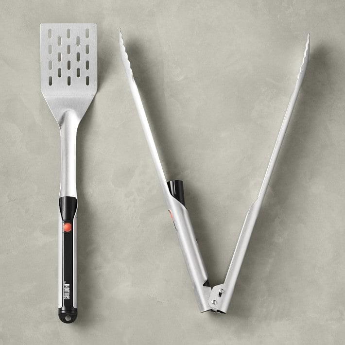 A pair of Grill Light Gift 2 Set bbq tongs and spatulas with XSpecial Marketplace.