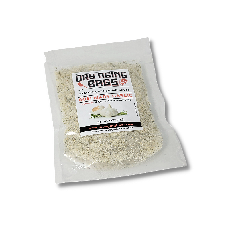 A bag with a Rosemary Garlic Salt by DryAgingBags™ | The Best Way To Dry Age Meat At Home and a Blade Meat Tenderizer Tool.