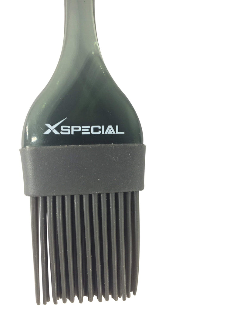 A black XSpecial silicone brush with the word x special on it.