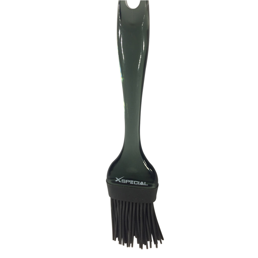 A green silicone brush with black bristles on a white background.
Cooking Brush By XSpecial