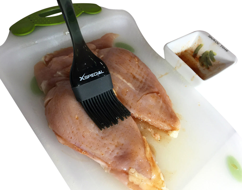 A piece of chicken on a cutting board with a spatula in the kitchen.
Product Name: This product is out of stock. Do not purchased from other seller is not the original Cooking Brush By XSpecial!
Brand Name: XSpecial