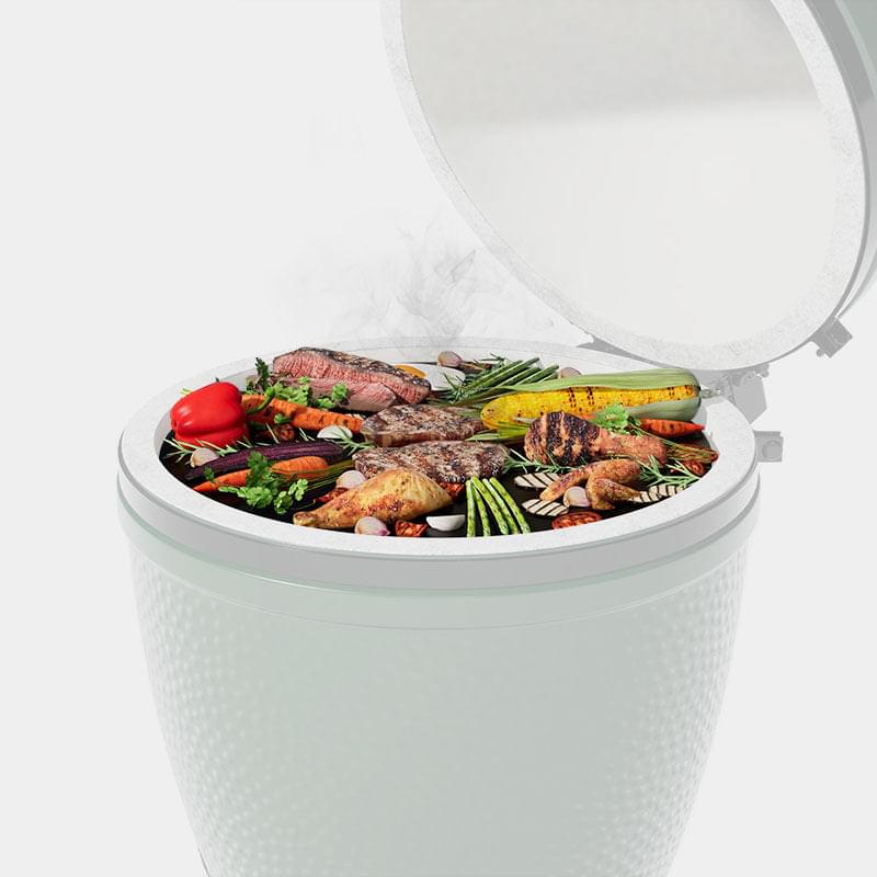 An Arteflame Outdoor Grills white trash can filled with XSpecial vegetables and Meat Lovers meat.