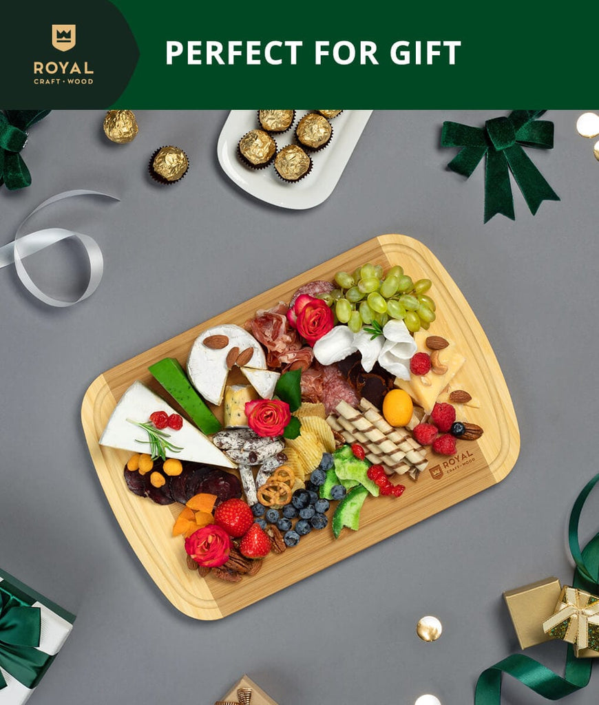 A luxury cutting board featuring the perfect tray of fruit and cheese, ideal for XSpecial foodies.