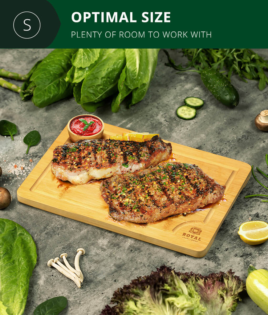 A Small Cutting Board 12×8" by Royal Craft Wood with meat on it, perfect for foodies.