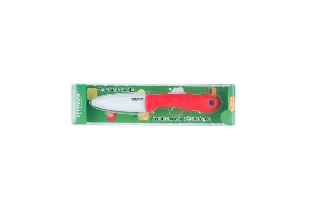 A small red Peterson Housewares & Artwares kitchen knife in an XSpecial package.