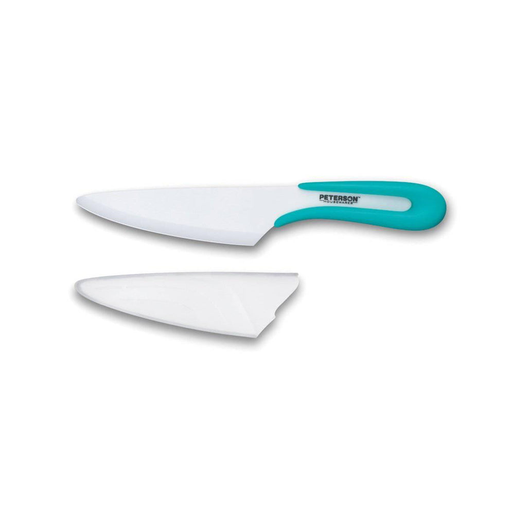 A white and turquoise Ceramic knife - 5" U HANDLE CERAMIC KNIFE by Peterson Housewares & Artwares on a white surface, perfect for Meat Lovers.