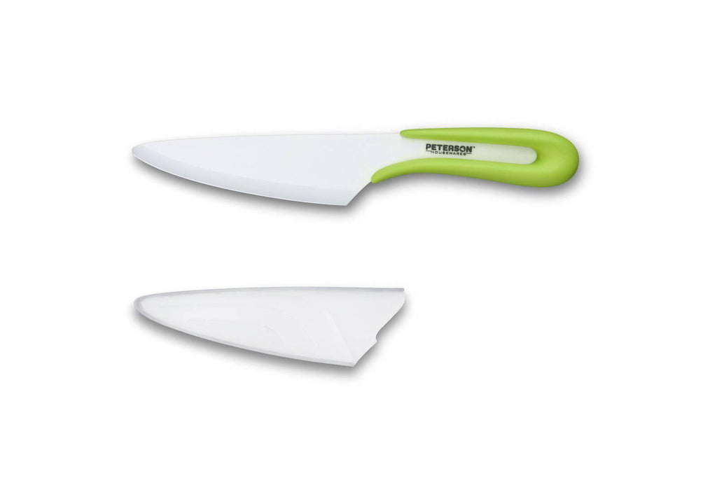A white and green Ceramic knife - 5" U HANDLE CERAMIC KNIFE by Peterson Housewares & Artwares on a white surface available at XSpecial Marketplace.