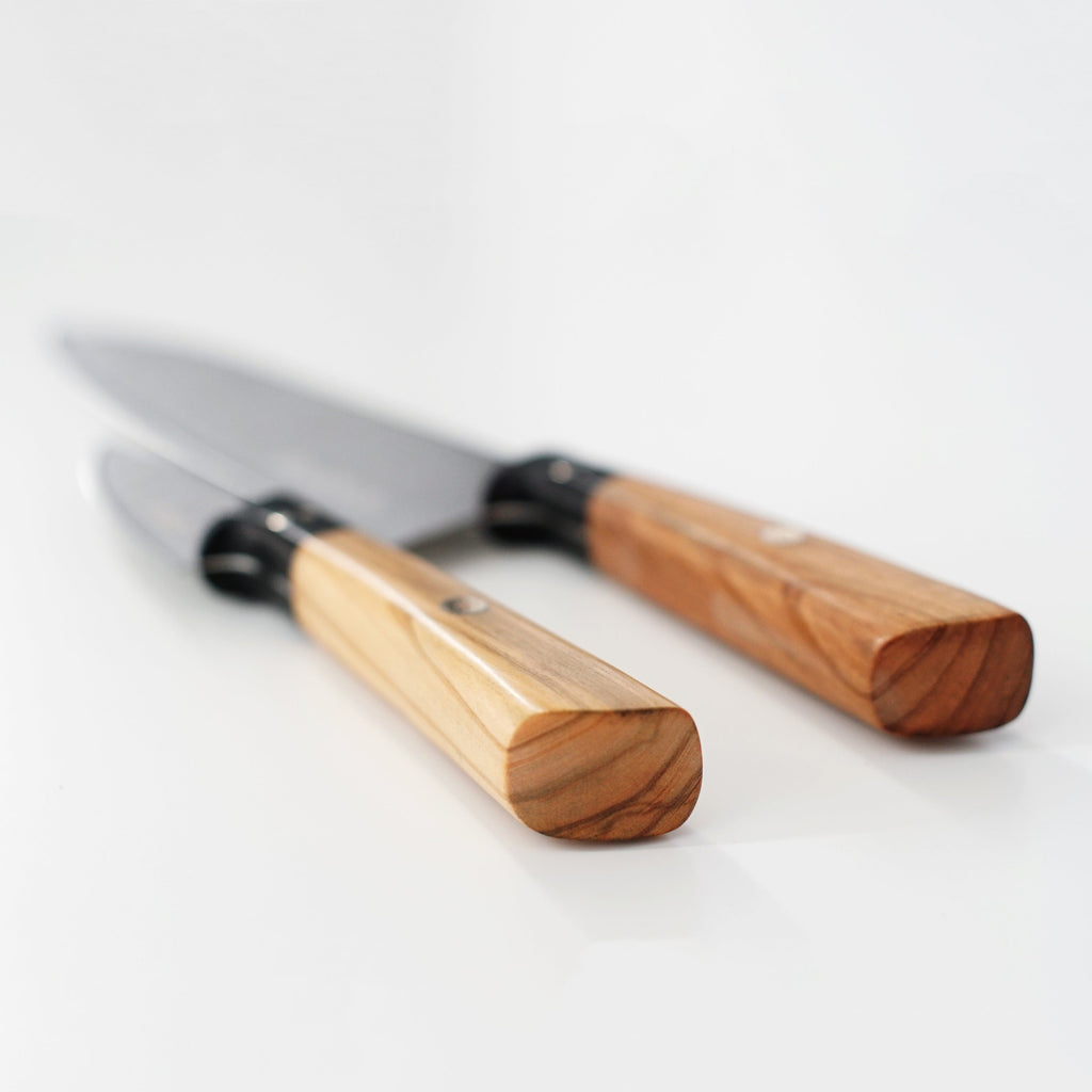 Two Carnivore Club USA Kitchen Knife Sets, perfect for foodies and meat lovers, displayed on a white surface.