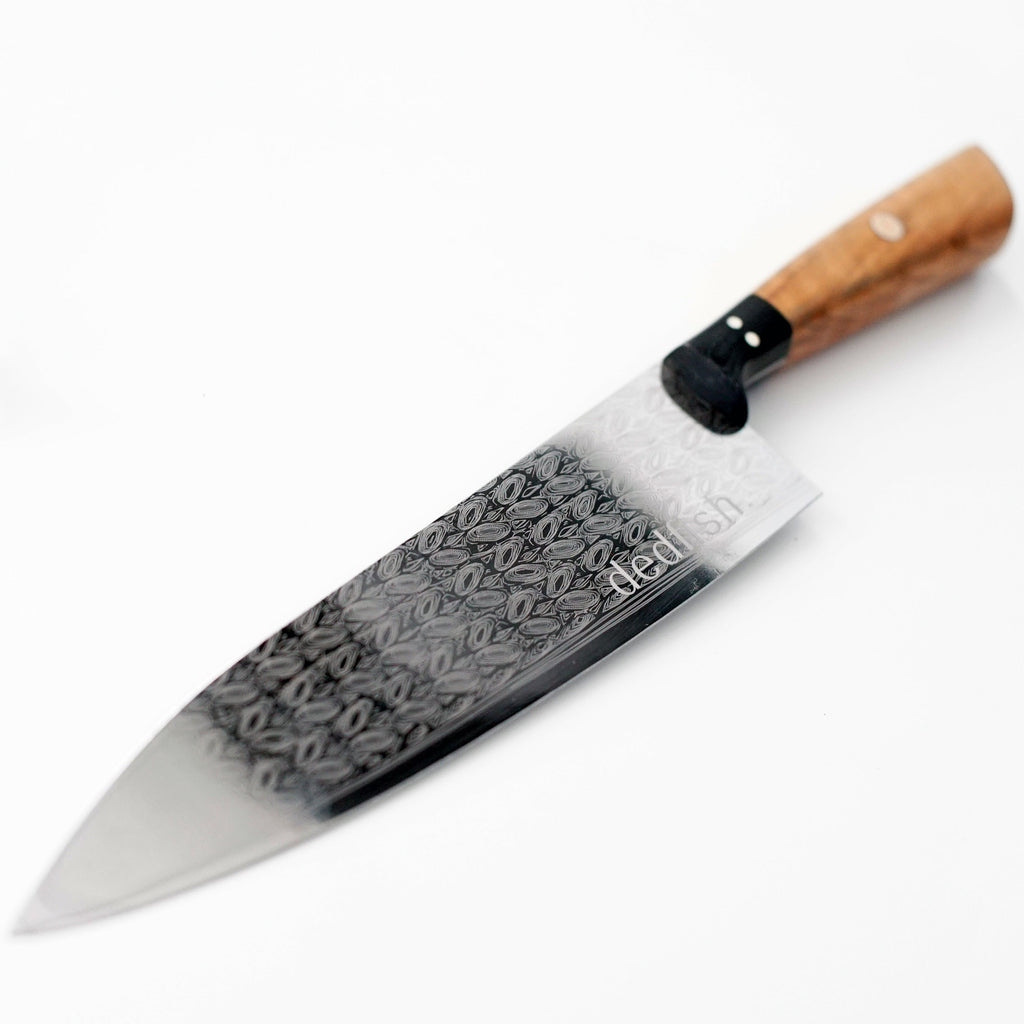 A 50% OFF with Purchase - Dedfish Co. Kitchen Knife Set by Carnivore Club USA with an olive wood handle on a white surface.