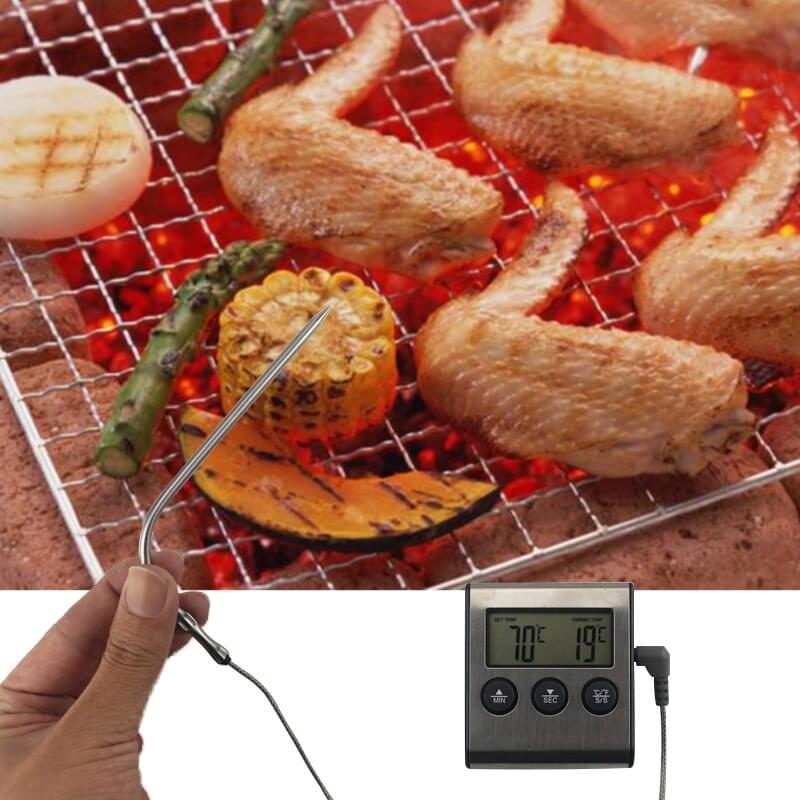 A person is using a Blade Meat Tenderizer Tool to prepare food on a grill, attracting Foodies and Meat Lovers with the help of their Digital BBQ Thermometer by DryAgingBags™