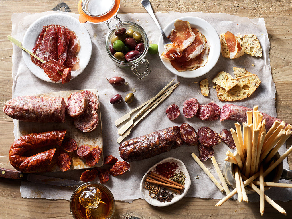 A meat lovers' feast filled with Classic Box Meats & Jams, Crackers, and Cheese from the XSpecial Marketplace by Carnivore Club USA.