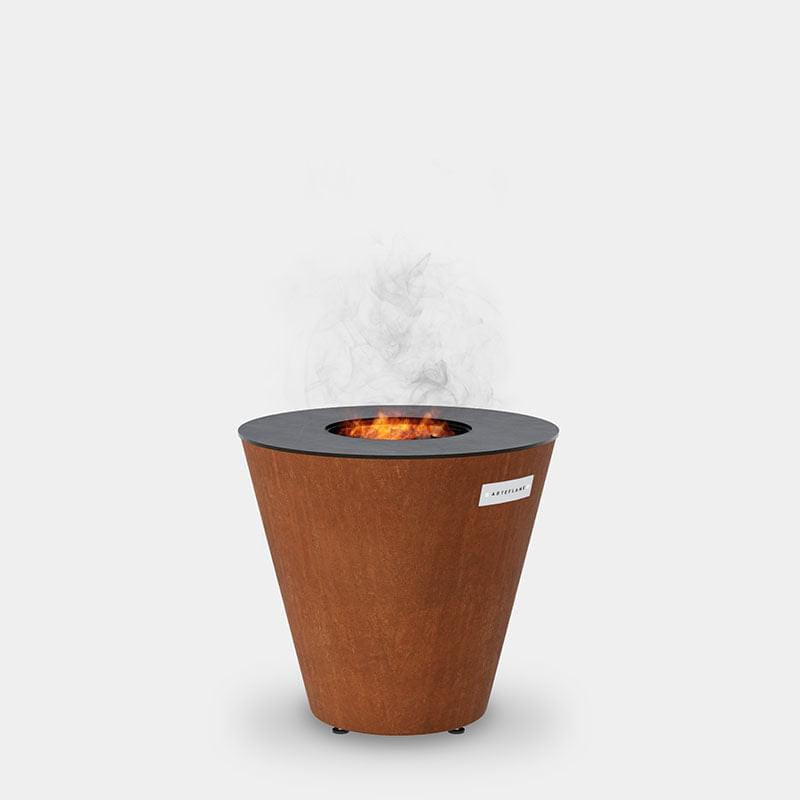 An Arteflame Outdoor Grills fire pit with smoke and XSpecial Marketplace branding.