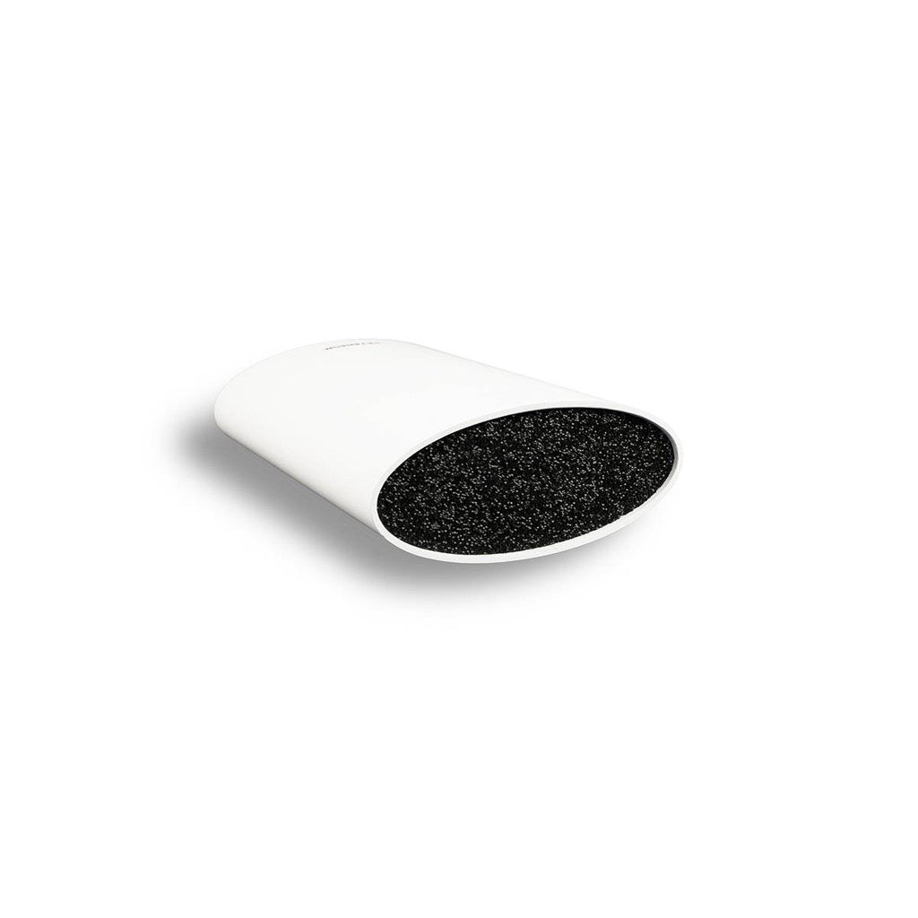 A Peterson Housewares & Artwares UTILITY KNIFE BLOCK (Oval/WHITE) container with black sand, perfect for Foodies and Meat Lovers.