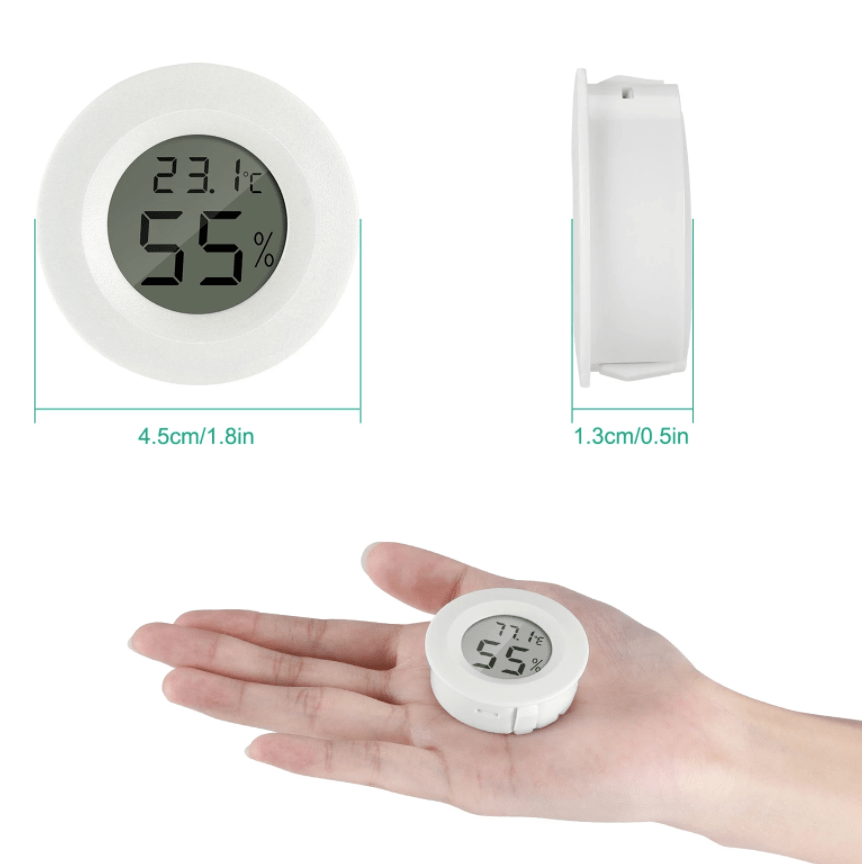 A Digital Hygrometer for Meat Lovers by DryAgingBags™ is shown in a hand.