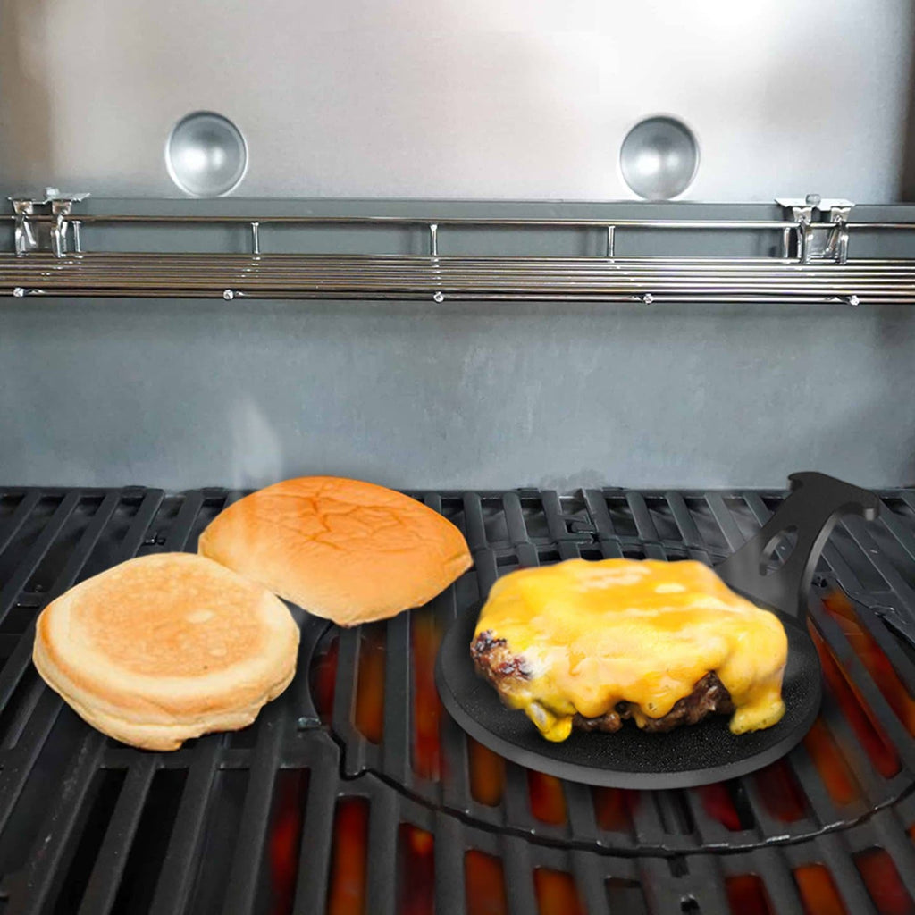 A Mini Plancha Griddle for Perfect Burgers from Arteflame Outdoor Grills is being cooked on a grill using a Meat Tenderizer Tool.