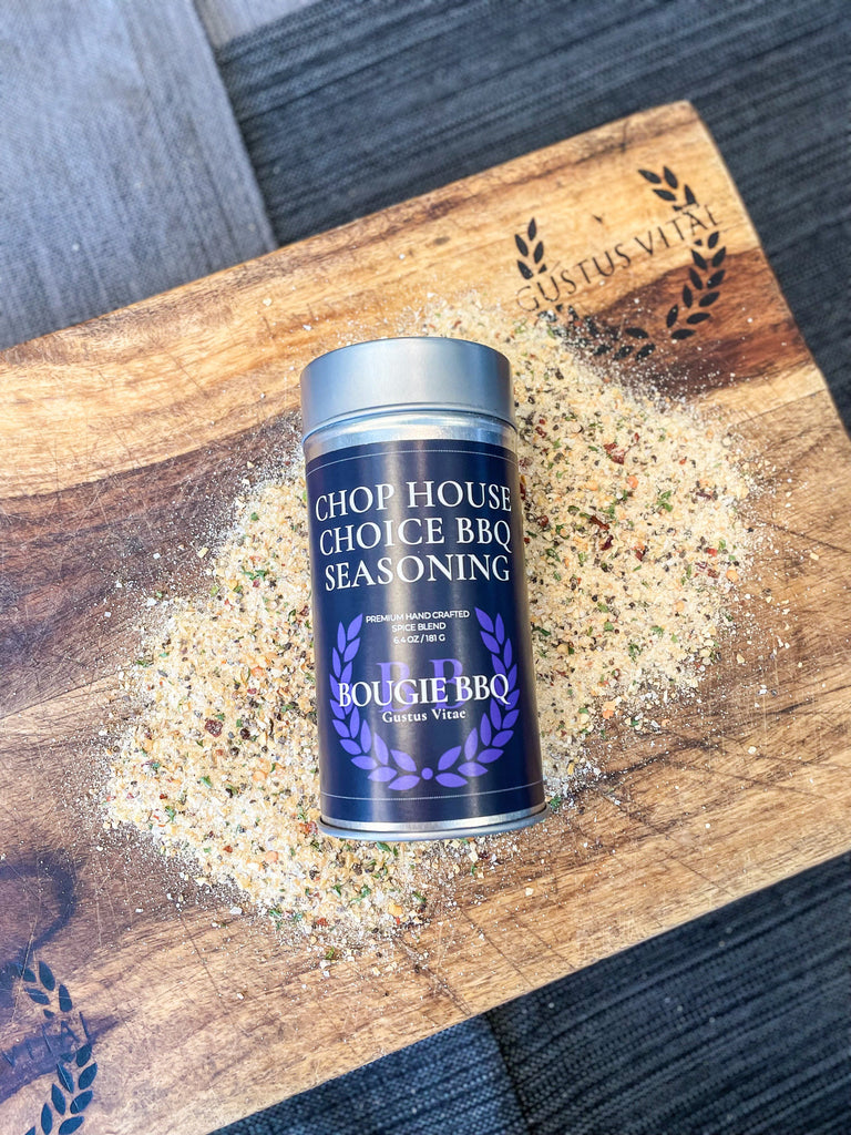 A tin of Chop House Choice BBQ seasoning by Gustus Vitae on a cutting board.