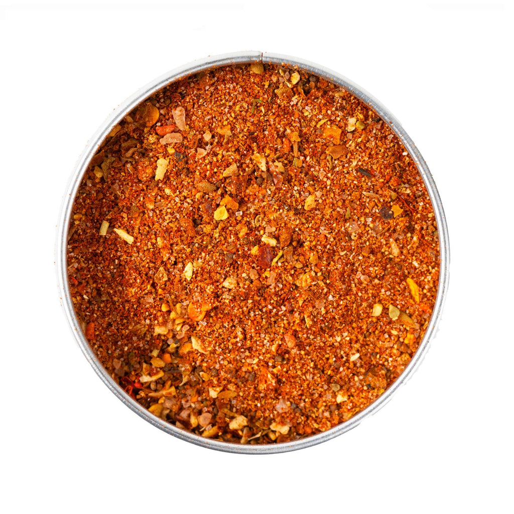 A bowl of Deep Cuts Blackening BBQ Rub & Seasoning by Gustus Vitae on a white background.