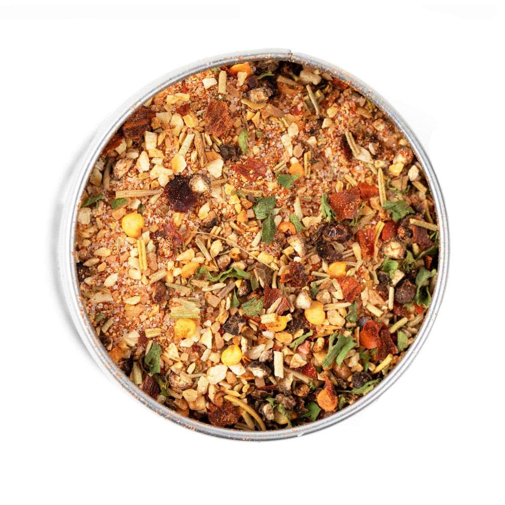 A pan with a lot of food in it seasoned with Herbed Maple & Spice BBQ Seasoning by Gustus Vitae.