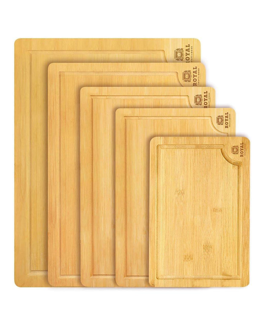 A set of Royal Craft Wood Chopping Board Set of 5 Piece featuring a Blade Meat Tenderizer Tool for meat lovers.