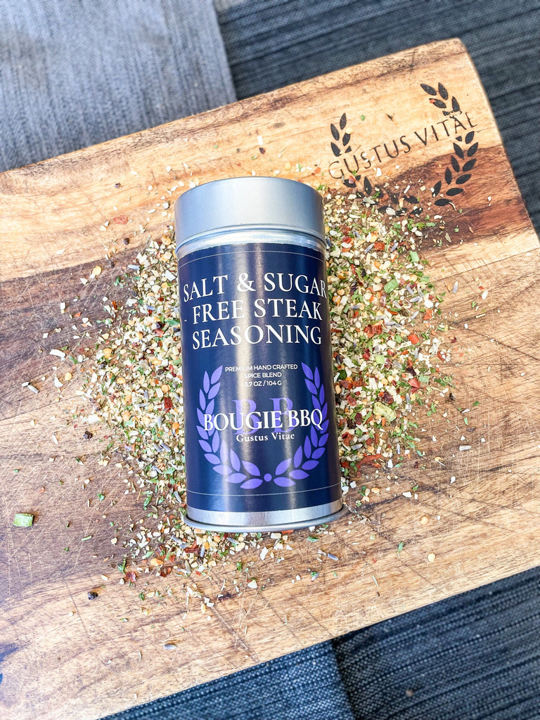 All natural blend of Salt & Sugar Free Steak Seasoning by Gustus Vitae on a cutting board.