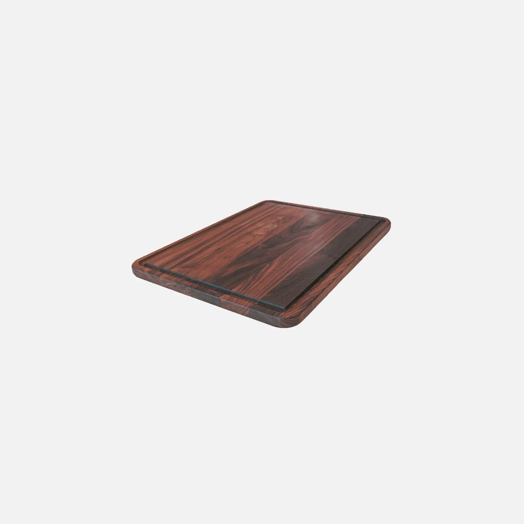A Small Walnut Wood Cutting Board by Virginia Boys Kitchens, perfect for meat tenderizing, on a white background.