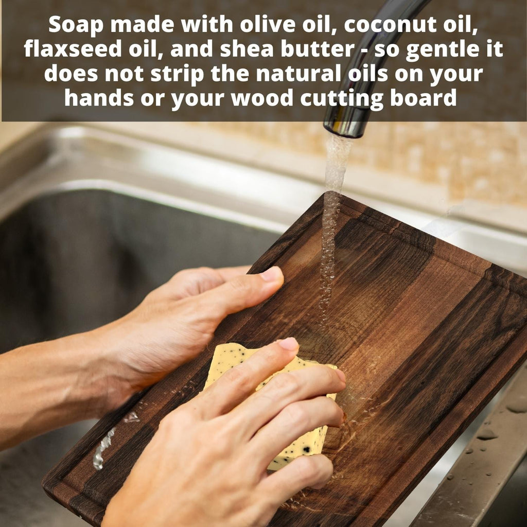 A foodie is scrubbing a wooden cutting board with Virginia Boys Kitchens' Complete Care Kit for Wood Cutting Boards.
