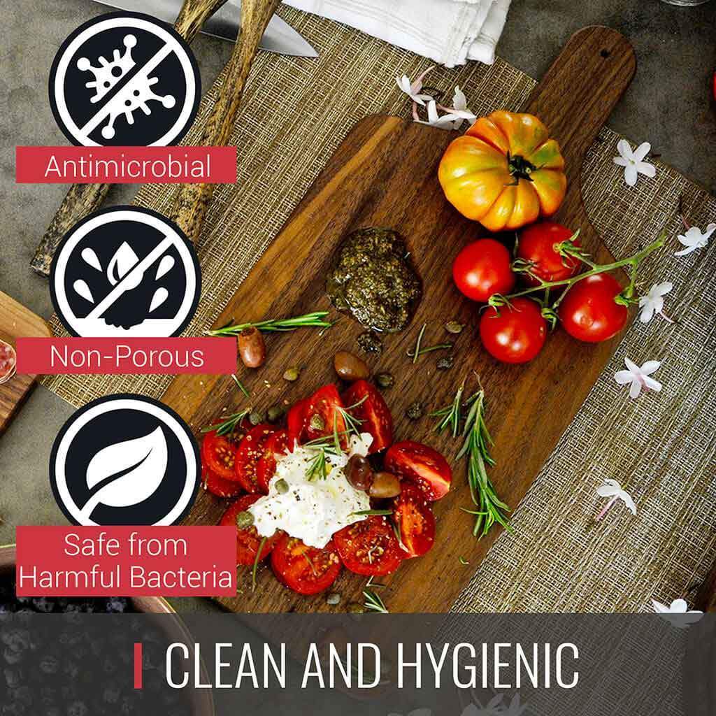 Clean and hygienic ingredients on a Virginia Boys Kitchens Walnut Cutting Board and Charcuterie Paddle with Handle, perfect for foodies.