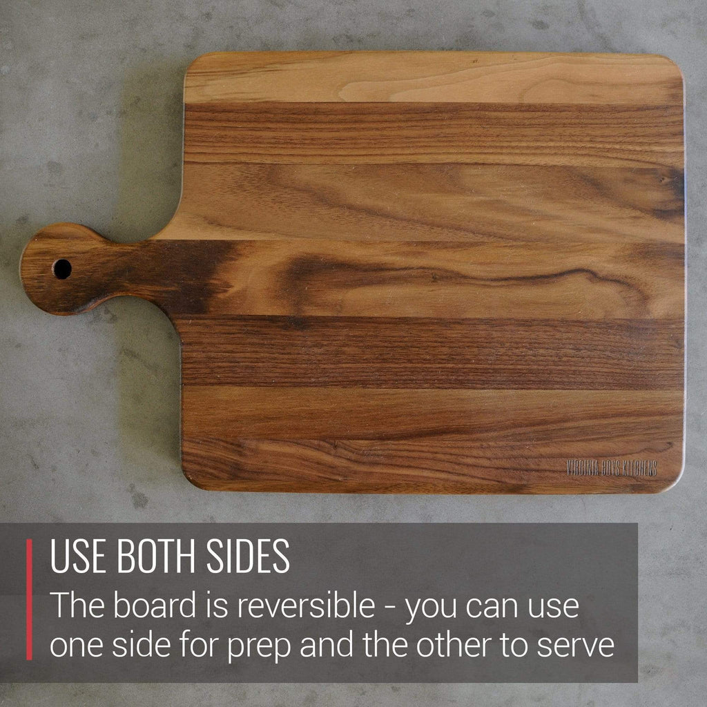 Use both sides of the Mom's Cutting Board - Walnut Cutting Board with Knob Handle by Virginia Boys Kitchens; you can use one side for prep and the other for serving, as well as utilize
