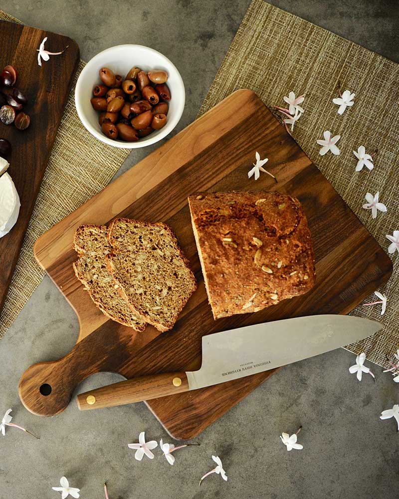A Mom's Cutting Board with Knob Handle and Meat Tenderizer Tool from Virginia Boys Kitchens.